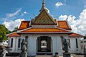 Bangkok Wat Arun - The inner side of the entrance of the Ubosot with Chinese door guardians. 